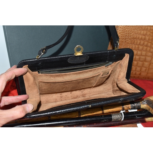 823 - A BOX AND LOOSE HANDBAGS AND WALKING STICKS, to include four walking sticks, including one with silv... 