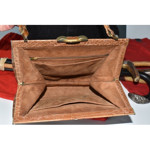 823 - A BOX AND LOOSE HANDBAGS AND WALKING STICKS, to include four walking sticks, including one with silv... 