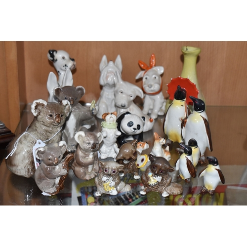 827 - A COLLECTION OF BESWICK ANIMALS, comprising four Koalas: model no 1038, 1089, 1039 and 1040, Panda C... 