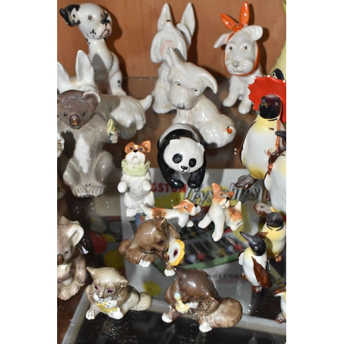 827 - A COLLECTION OF BESWICK ANIMALS, comprising four Koalas: model no 1038, 1089, 1039 and 1040, Panda C... 