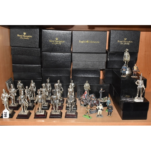 799 - A GROUP OF METAL VINTAGE SOLDIER FIGURES, comprising sixteen miniature silver plated Royal Hampshire... 