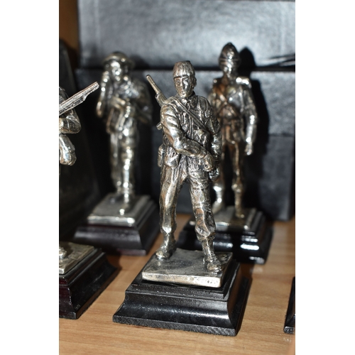 799 - A GROUP OF METAL VINTAGE SOLDIER FIGURES, comprising sixteen miniature silver plated Royal Hampshire... 