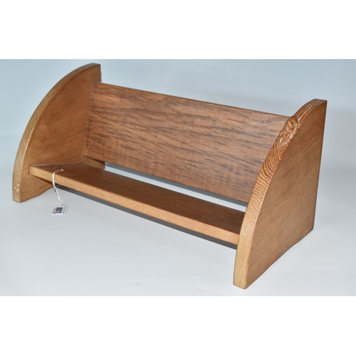 801 - A ROBERT MOUSEMAN THOMPSON OAK BOOK SHELF, single shelf with shaped adzed ends, carved with signatur... 