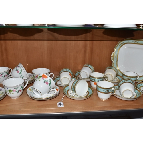 804 - A GROUP OF CERAMIC TEAWARE, comprising 19th-century Minton moulded handle cake plate, nine tea cups,... 