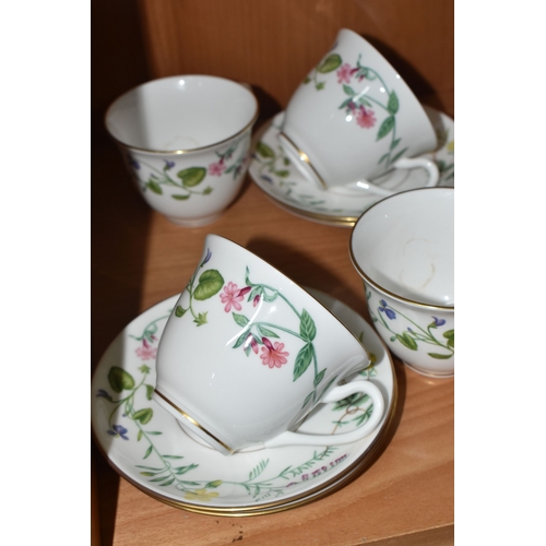 804 - A GROUP OF CERAMIC TEAWARE, comprising 19th-century Minton moulded handle cake plate, nine tea cups,... 