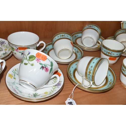 804 - A GROUP OF CERAMIC TEAWARE, comprising 19th-century Minton moulded handle cake plate, nine tea cups,... 