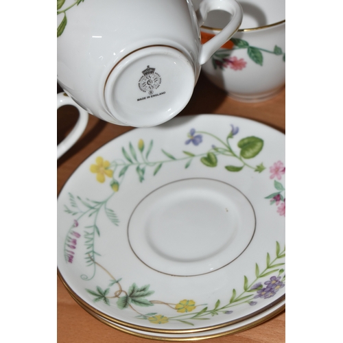 804 - A GROUP OF CERAMIC TEAWARE, comprising 19th-century Minton moulded handle cake plate, nine tea cups,... 
