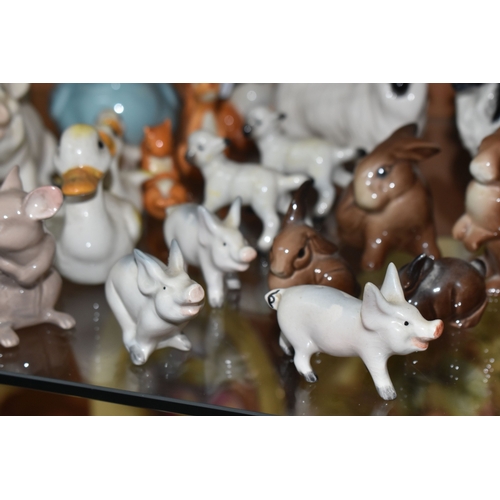 808 - A GROUP OF BESWICK ANIMALS, comprising three Squirrels model no 1007, no 1008 and no 1009, four Rabb... 