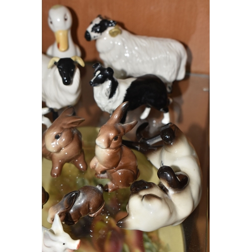 808 - A GROUP OF BESWICK ANIMALS, comprising three Squirrels model no 1007, no 1008 and no 1009, four Rabb... 
