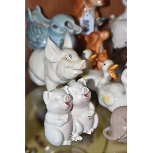 808 - A GROUP OF BESWICK ANIMALS, comprising three Squirrels model no 1007, no 1008 and no 1009, four Rabb... 