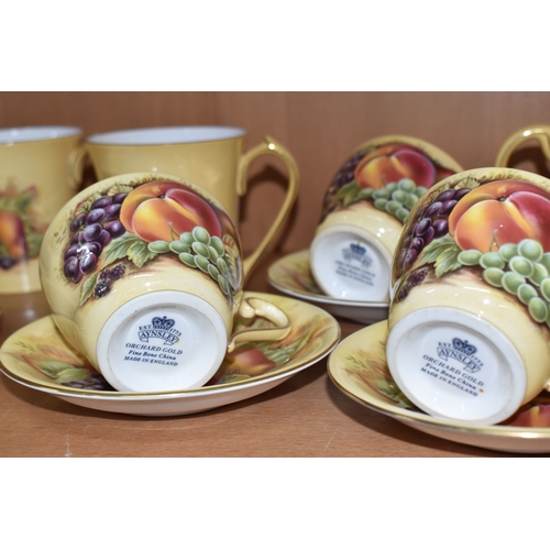 818 - THIRTY TWO PIECES OF AYNSLEY 'ORCHARD GOLD' TEA AND GIFT WARES, comprising a sandwich plate (second ... 