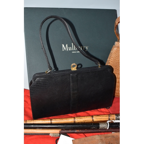 823 - A BOX AND LOOSE HANDBAGS AND WALKING STICKS, to include four walking sticks, including one with silv... 