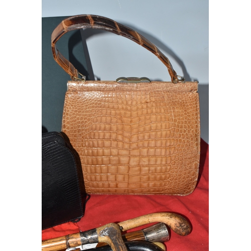 823 - A BOX AND LOOSE HANDBAGS AND WALKING STICKS, to include four walking sticks, including one with silv... 