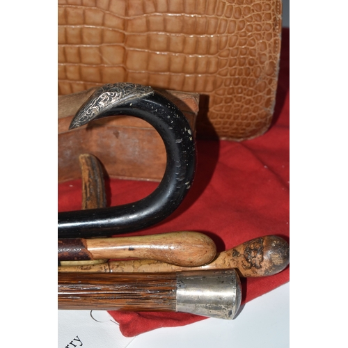 823 - A BOX AND LOOSE HANDBAGS AND WALKING STICKS, to include four walking sticks, including one with silv... 