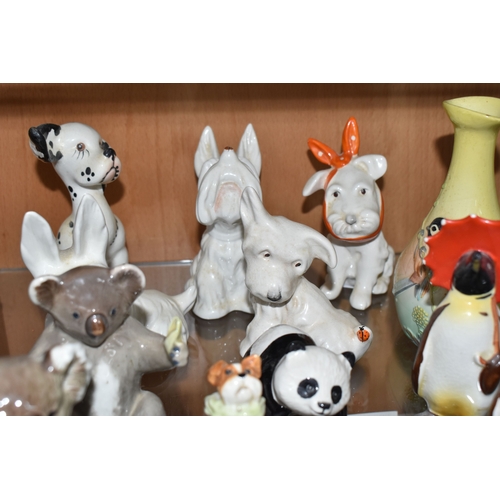 827 - A COLLECTION OF BESWICK ANIMALS, comprising four Koalas: model no 1038, 1089, 1039 and 1040, Panda C... 