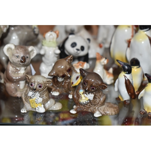 827 - A COLLECTION OF BESWICK ANIMALS, comprising four Koalas: model no 1038, 1089, 1039 and 1040, Panda C... 