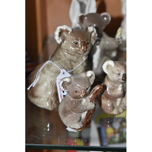 827 - A COLLECTION OF BESWICK ANIMALS, comprising four Koalas: model no 1038, 1089, 1039 and 1040, Panda C... 