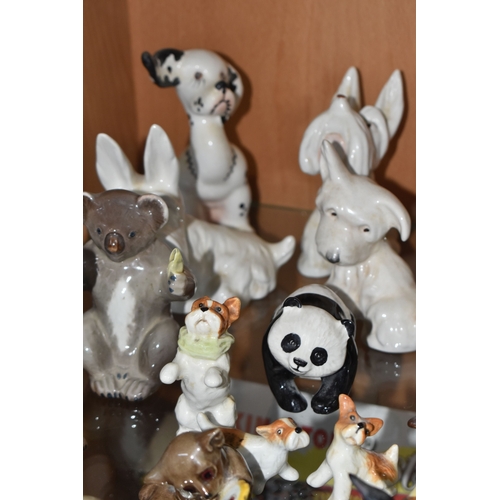 827 - A COLLECTION OF BESWICK ANIMALS, comprising four Koalas: model no 1038, 1089, 1039 and 1040, Panda C... 