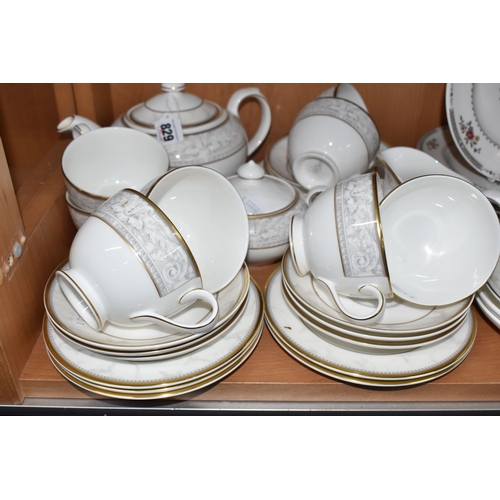 829 - A GROUP OF ROYAL DOULTON TEA WARES, comprising a Naples H5309 tea set: teapot (slight fault? on spou... 