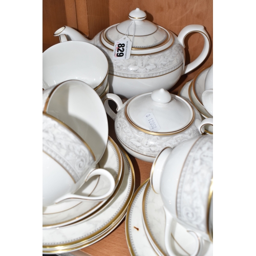 829 - A GROUP OF ROYAL DOULTON TEA WARES, comprising a Naples H5309 tea set: teapot (slight fault? on spou... 