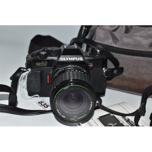835 - TWO OLYMPUS CAMERAS, comprising an Olympus OM-2 fitted with a Sirius f3.5-4.5 28-70mm lens, and an O... 