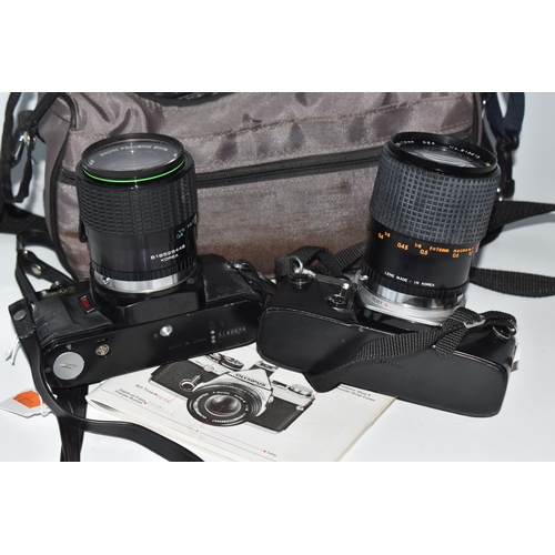 835 - TWO OLYMPUS CAMERAS, comprising an Olympus OM-2 fitted with a Sirius f3.5-4.5 28-70mm lens, and an O... 