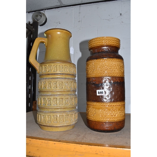 846 - TWO LARGE FLOOR STANDING WEST GERMAN VASES, the first is of tubular form with handle in beige with i... 