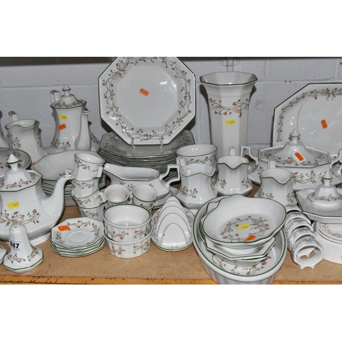 847 - A LARGE 'ETERNAL BEAU' DINNER SERVICE MOSTLY FROM JOHNSON BROTHERS consisting of two large serving d... 
