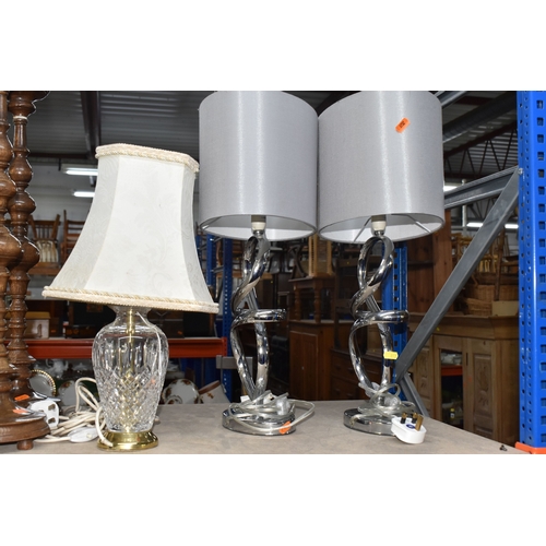 852 - A GROUP OF LIGHTING RELATED ITEMS to include a pair of modern chromed table lamps with grey shades a... 
