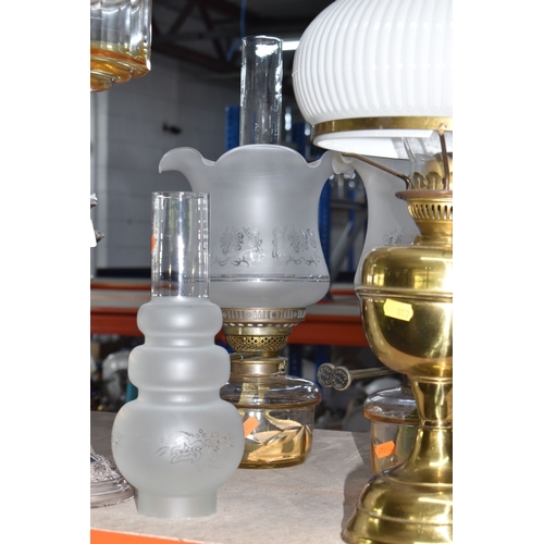 852 - A GROUP OF LIGHTING RELATED ITEMS to include a pair of modern chromed table lamps with grey shades a... 
