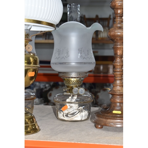 852 - A GROUP OF LIGHTING RELATED ITEMS to include a pair of modern chromed table lamps with grey shades a... 