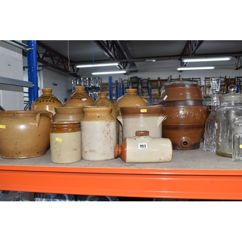 853 - A COLLECTION OF MAINLY STONEWARE PIECES to include four wine merchant flagons from John Charles Cole... 