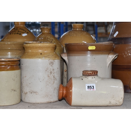 853 - A COLLECTION OF MAINLY STONEWARE PIECES to include four wine merchant flagons from John Charles Cole... 