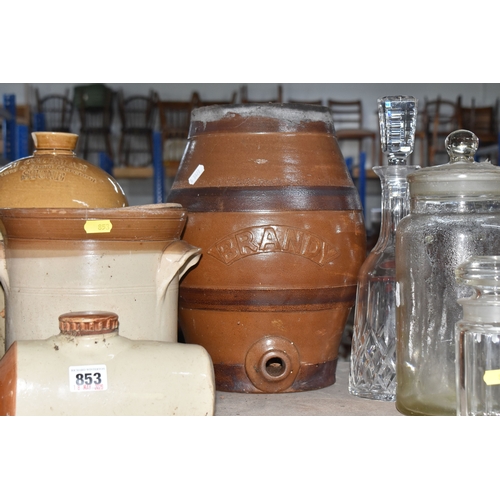 853 - A COLLECTION OF MAINLY STONEWARE PIECES to include four wine merchant flagons from John Charles Cole... 