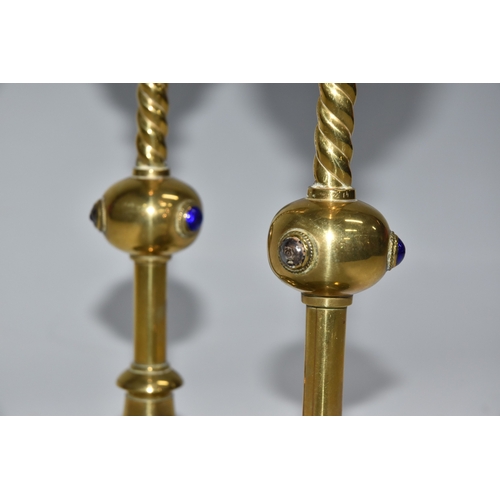 824 - A PAIR OF GEORGE BETJEMANN & SONS CANDLESTICKS, the brass arts and crafts style candlesticks with bl... 
