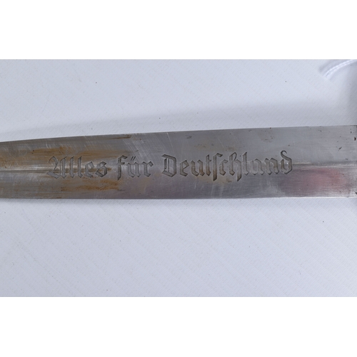 247 - A GERMAN SA DAGGER MADE BY CARL EICKHORN, the blade has its motto on one side and maker mark on the ... 