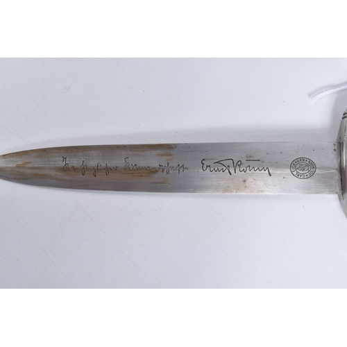 247 - A GERMAN SA DAGGER MADE BY CARL EICKHORN, the blade has its motto on one side and maker mark on the ... 