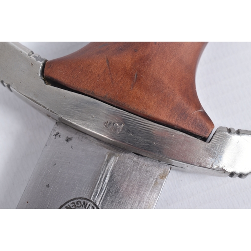 247 - A GERMAN SA DAGGER MADE BY CARL EICKHORN, the blade has its motto on one side and maker mark on the ... 