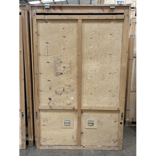 45 - AN INDUSTRY STANDARD WOODEN STORAGE CONTAINER, constructed from pine and plywood, on a pallet, width... 