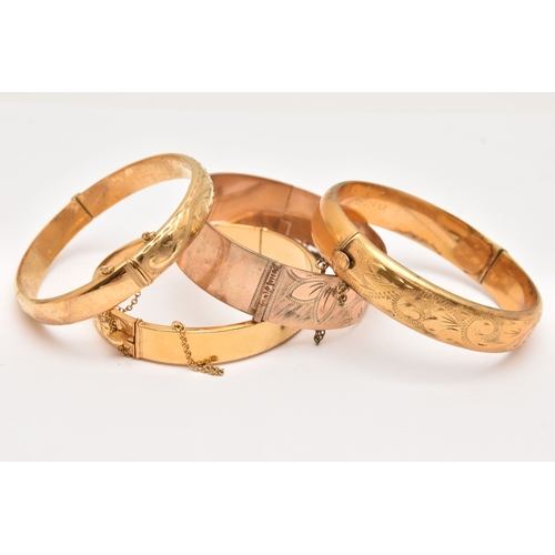 467 - FOUR ROLLED GOLD HINGED BANGLES, assorted widths, scrolling acanthus and floral detail, (condition r... 