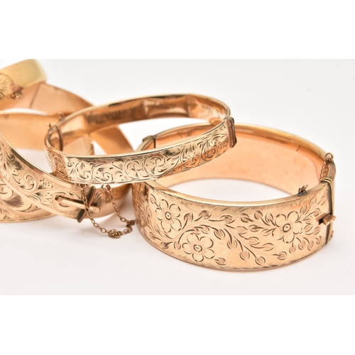 468 - FIVE 9CT METAL CORE BANGLES, assorted widths, all with scrolling acanthus detail, (condition report:... 
