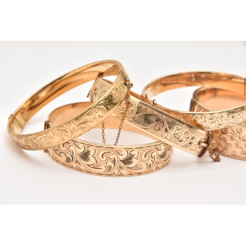 468 - FIVE 9CT METAL CORE BANGLES, assorted widths, all with scrolling acanthus detail, (condition report:... 