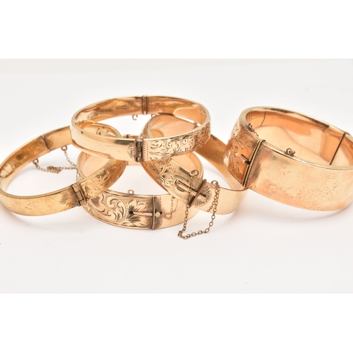 468 - FIVE 9CT METAL CORE BANGLES, assorted widths, all with scrolling acanthus detail, (condition report:... 
