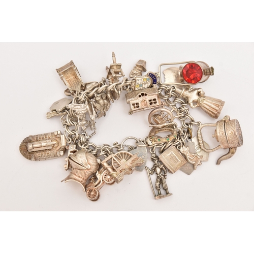 471 - A SILVER CHARM BRACELET, a silver double curb link chain bracelet fitted with a heart padlock clasp,... 