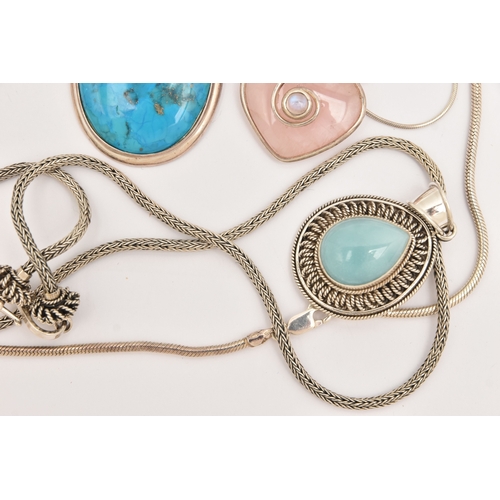 477 - FOUR WHITE METAL GEM SET NECKLACES, large pendants set with assorted stones, to include rose quartz,... 