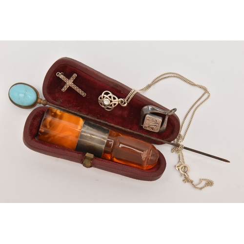 479 - A SMALL ASSORTMENT OF ITEMS, to include three white metal pendants and a chain, approximate gross we... 