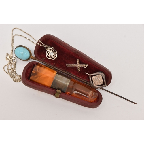 479 - A SMALL ASSORTMENT OF ITEMS, to include three white metal pendants and a chain, approximate gross we... 
