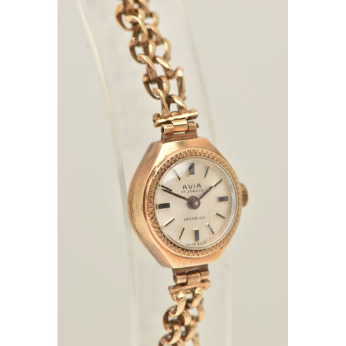 493 - A 9CT GOLD LADIES WRISTWATCH, hand wound movement, round dial signed 'Avia', baton markers, yellow g... 