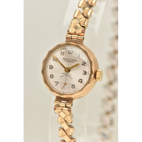495 - A YELLOW METAL LADIES WRISTWATCH, hand wound movement, round dial signed 'Excalibur', baton markers,... 