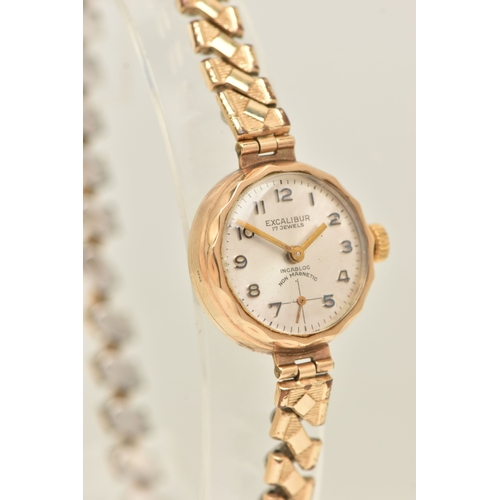 495 - A YELLOW METAL LADIES WRISTWATCH, hand wound movement, round dial signed 'Excalibur', baton markers,... 